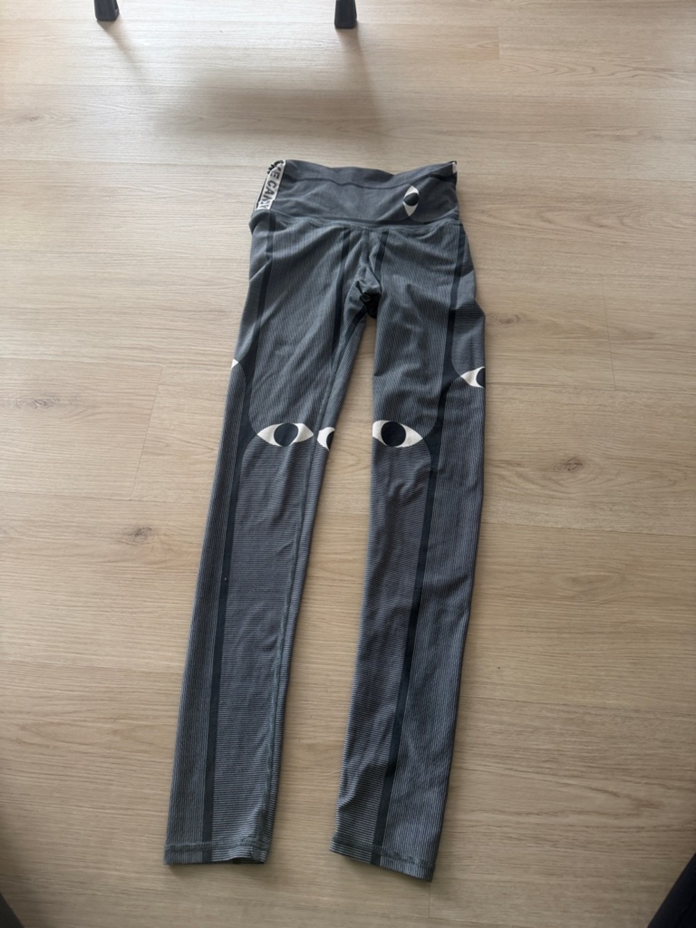 Niyama Sol Gray & Black Eye-Print Leggings